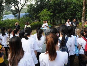 Students listening to a briefing by Forestry Department staff